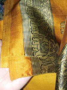 Ethnic Elephant pring yelloish orange saree...