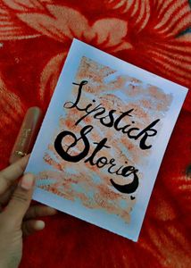 Hilary Rhoda Lipstick and a art piece