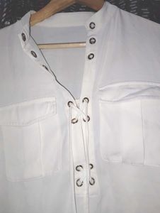 womens..... top..... off wight color