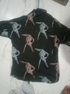 Gray Denim Jeans and a half shoulder shirt.