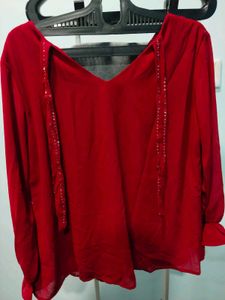 embellished red top