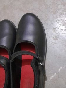 black and white school shoes