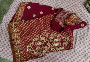 Elegant Maroon Embroidered Saree With Blouse