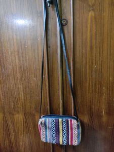 Indie print sling bag.