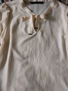 Elegant Cream Blouse with Tie Detail