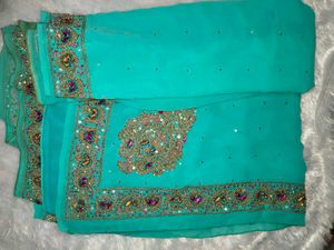 Elegant Teal Embellished Saree