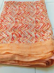Elegant Orange Patterned Saree