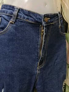 Ripped Dark Blue Jeans