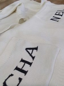 Ivory 'CHANEL' Knit crop top