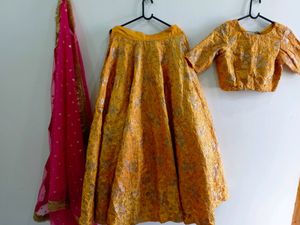 Yellow Bridal Partywear Lehenga .With Pink Dupatta