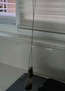 Silver soldier pendant necklace