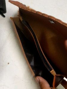 Brown Clutch with Pom-Pom