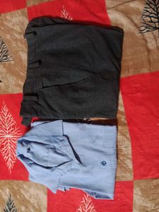 blue shirt with black pant