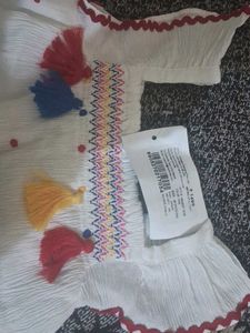 White Dress with Colorful Details