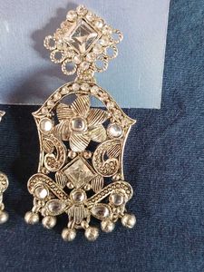 One necklace,  A Pair Of Earring