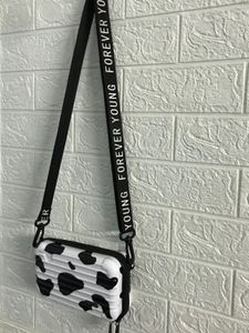 Cow Print Mini Suitcase Crossbody Bag