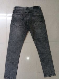 Ripped Gray Wash Jeans