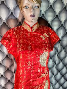 Cheongsam With Golden Thread Work On It