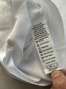 REINVENT - UCB Boys T Shirt Small