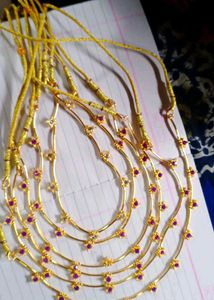 Gold Tone Necklace with Purple Accents