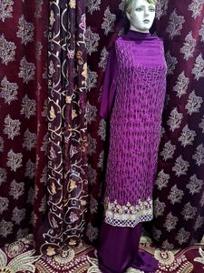 Elegant Purple Kurta Set with bridal clutch freebe