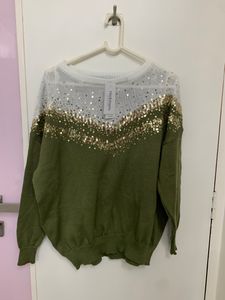 khaki green and white sweater with gold sequins
