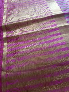 A Pattu Navy Blue nd Pink Coloured Saree.