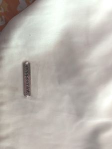 Elegant White Top with Flare Sleeves