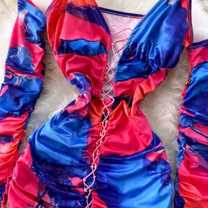 vibrant ruched bodycon dress with a tie-dye print