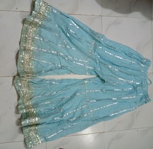 kurta (top), palazzo pants, and a dupatta (scarf).