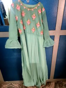 A Georgette Gown With embroidered Shrug.