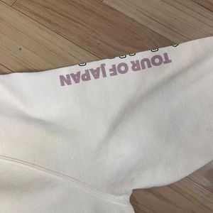 Cream Cropped Sweatshirt.