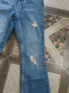 Distressed Bootcut Jeans