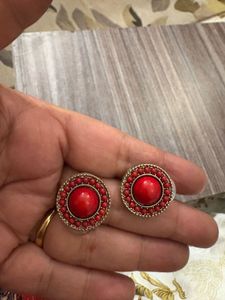 red color beautiful studs.