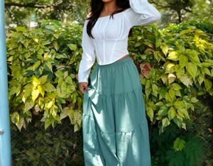 White Corset Top And Green Maxi Skirt