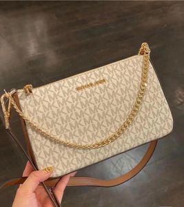 Michael Kors Clutch/ sling bags