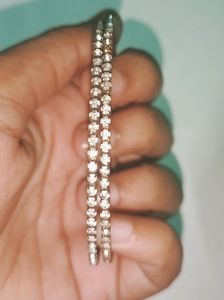 4 sets of earings, A braislate , 2 stone bangles