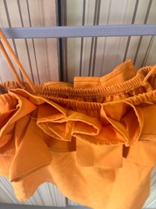 Orange Ruffle Crop Top