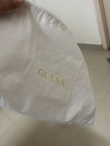 GUESS Women Solid Half Moon Fringed Shoulder bag