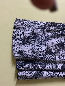 Black Top With White Embroidery And Mixed