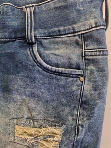 Women Ripped Faded Blue Jeans