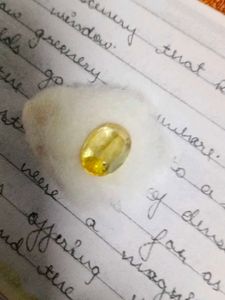 A yellow sapphire, also known as Pukhraj (पुखराज)