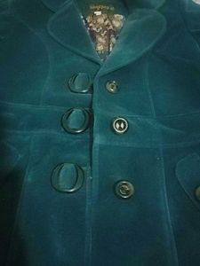 Woman&#39;s Blazer With Removable And Attachable Cap