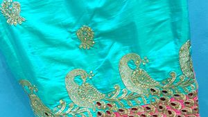 Elegant Turquoise Embroidered Saree