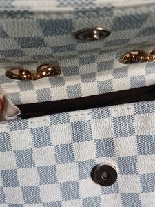 White And Gray Sling Bag