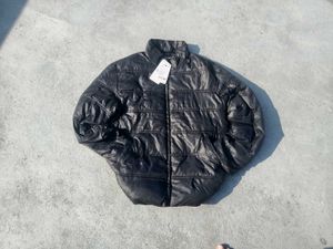 A Black Colour Puffer Jacket