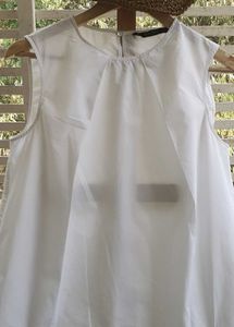 White Sleeveless Blouse
