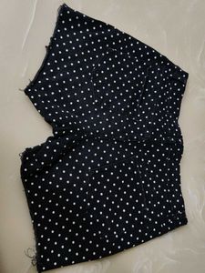 A beautiful black hipster shorts with polka dots.