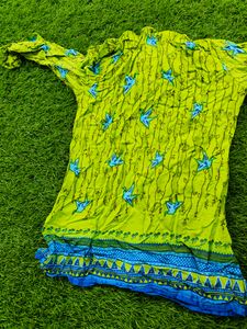 Flourescent green 💚 tunic with blue origami birds