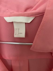 Pink Sleeveless Blouse